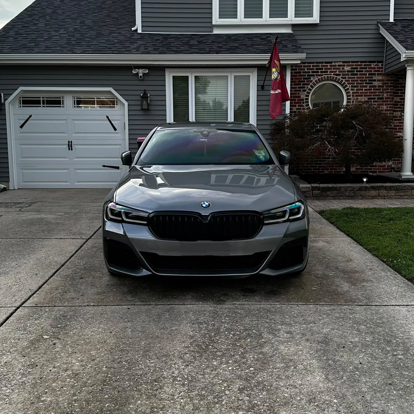 Grey BMW 5 Series detailed in a South Jersey driveway