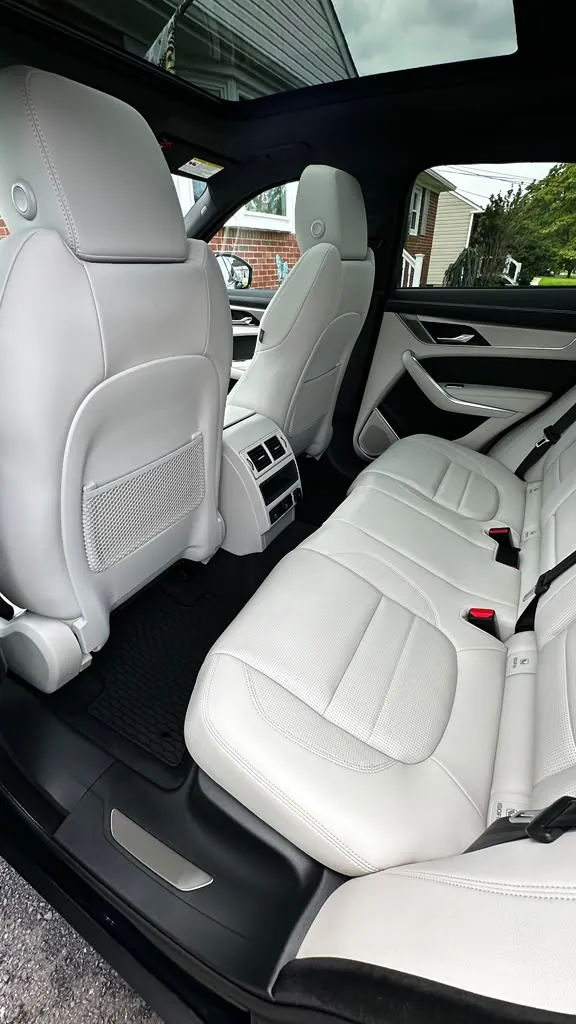 White leather Jaguar seats after interior cleaning